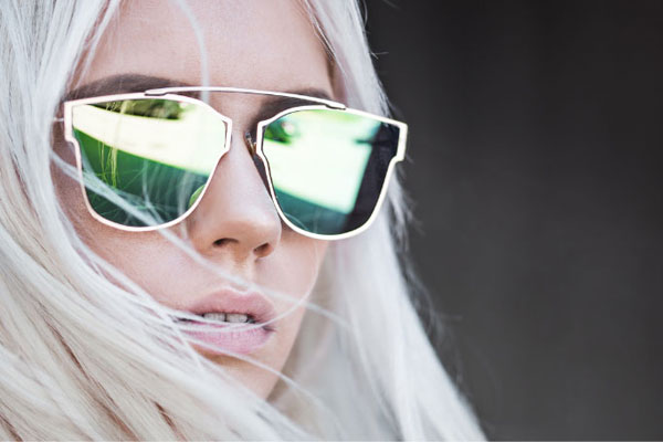 girl wearing flat lens sunglasses